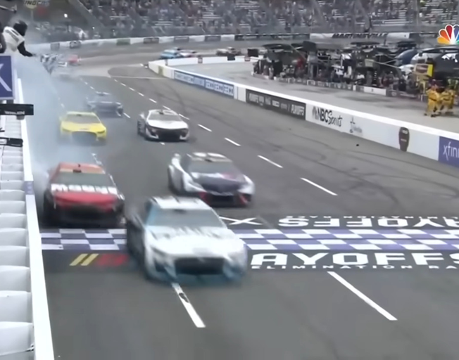 Ross Chastain crossing finish line just ahead of Denny Hamlin at Martinsville Speedway 10-30-22